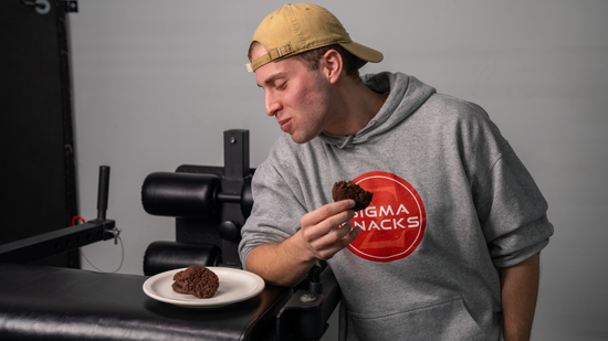 A stack of Sigma Snacks chocolate caffeine cookies on a kitchen counter